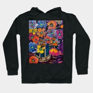 A lovely abstract background and vibrant flowers in a glass vase . Hoodie